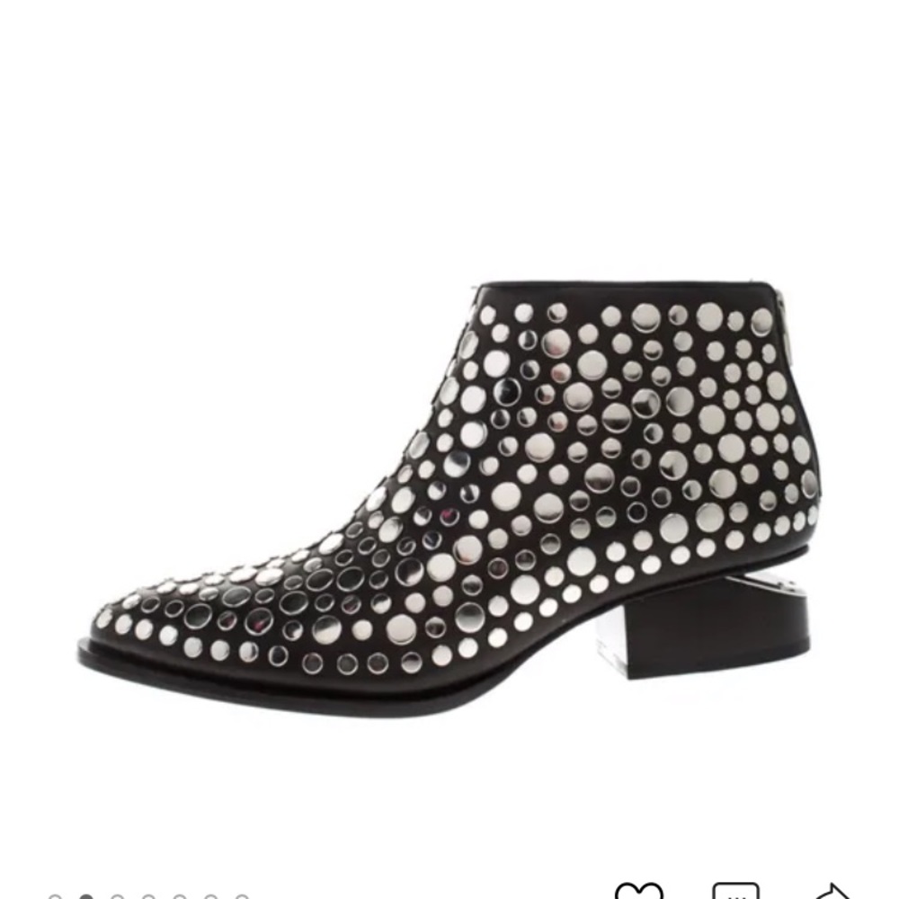Black leather studded boots with cutout heels